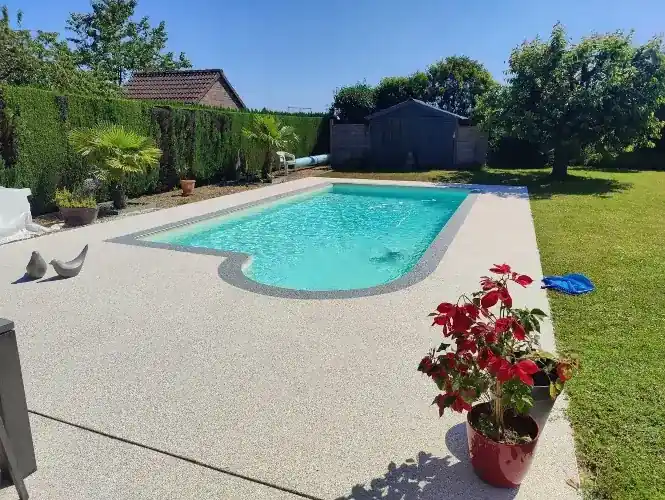 Pose de tapis de pierre en granulats de marbre